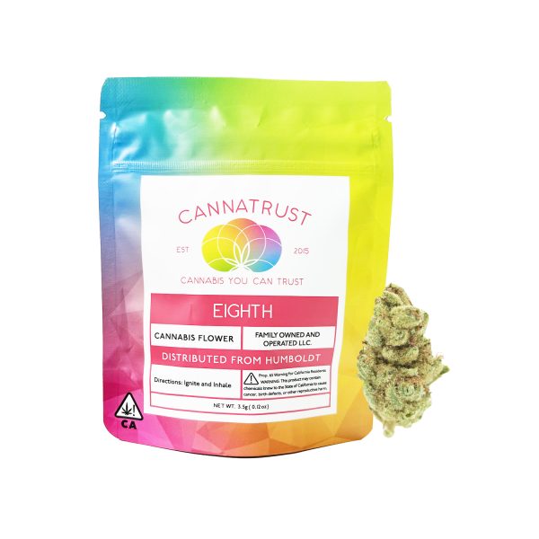 Cannatrust Fruit Punch cannabis flower showcasing dense, frosty buds with vibrant green and orange hues