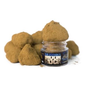 Vanilla Ice Cream MoonRocks cannabis flower, coated with hash oil and kief, offering a rich and creamy flavor with potent effects.